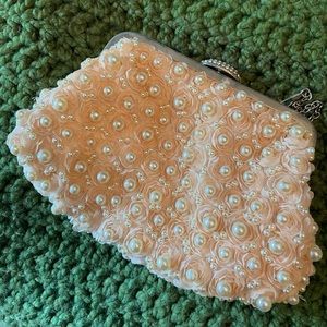 Pink pearl clutch